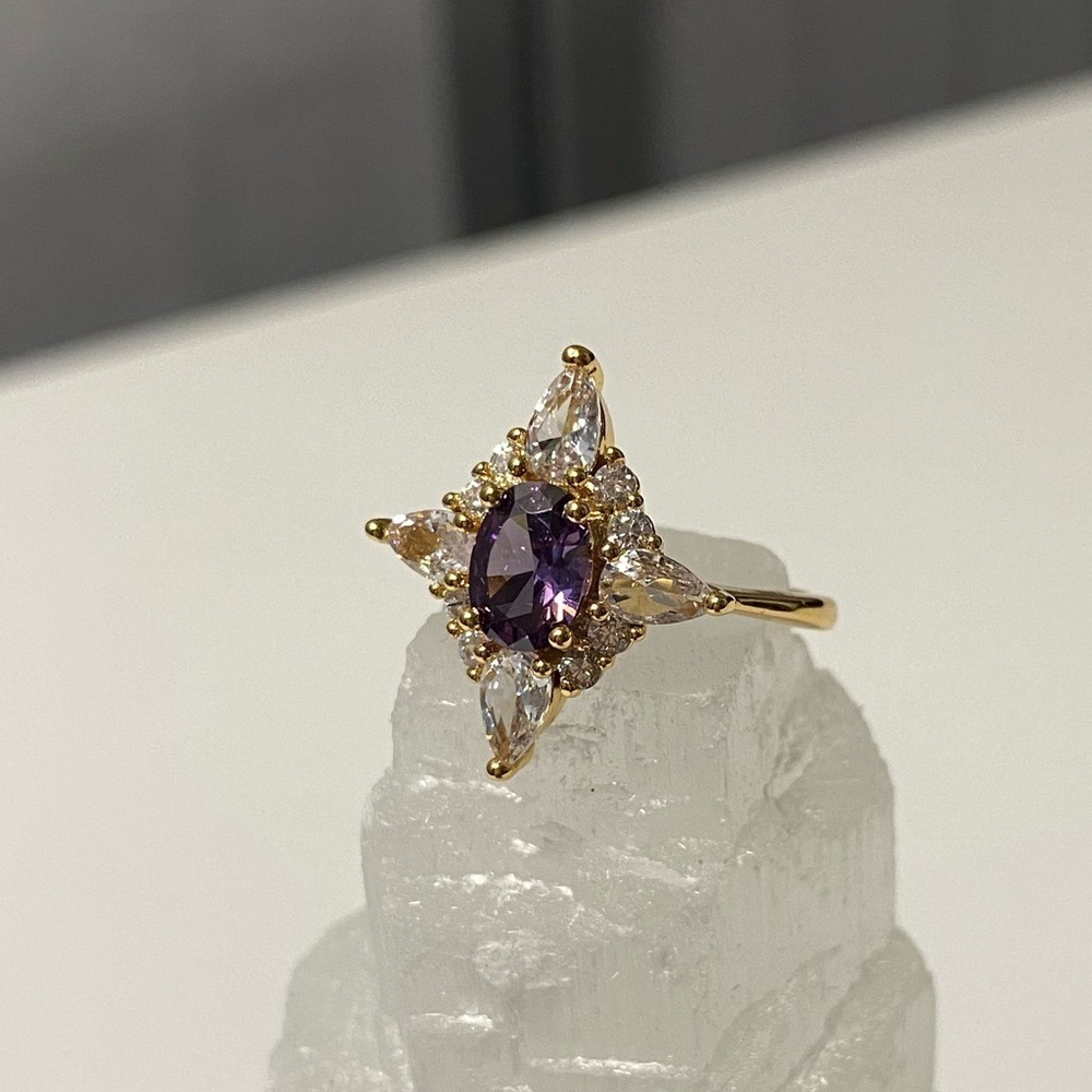 Gold Plated with Amethyst purple coloured middle stone ring - size 8